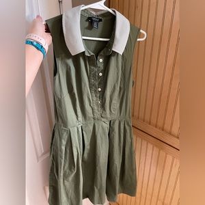 Sage green knee length dress. Striped collar and belt.